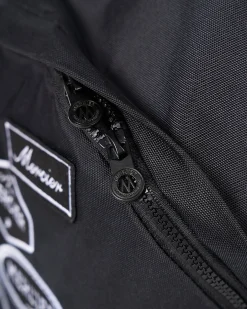 Black Mono Badge Backpack